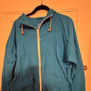 L.L. Bean raincoat in teal color with white zippers and trim.